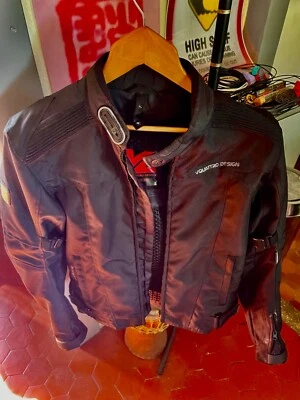 blouson moto femme/ homme noire taille S 100% polyester état neuf. - Photo 1/3