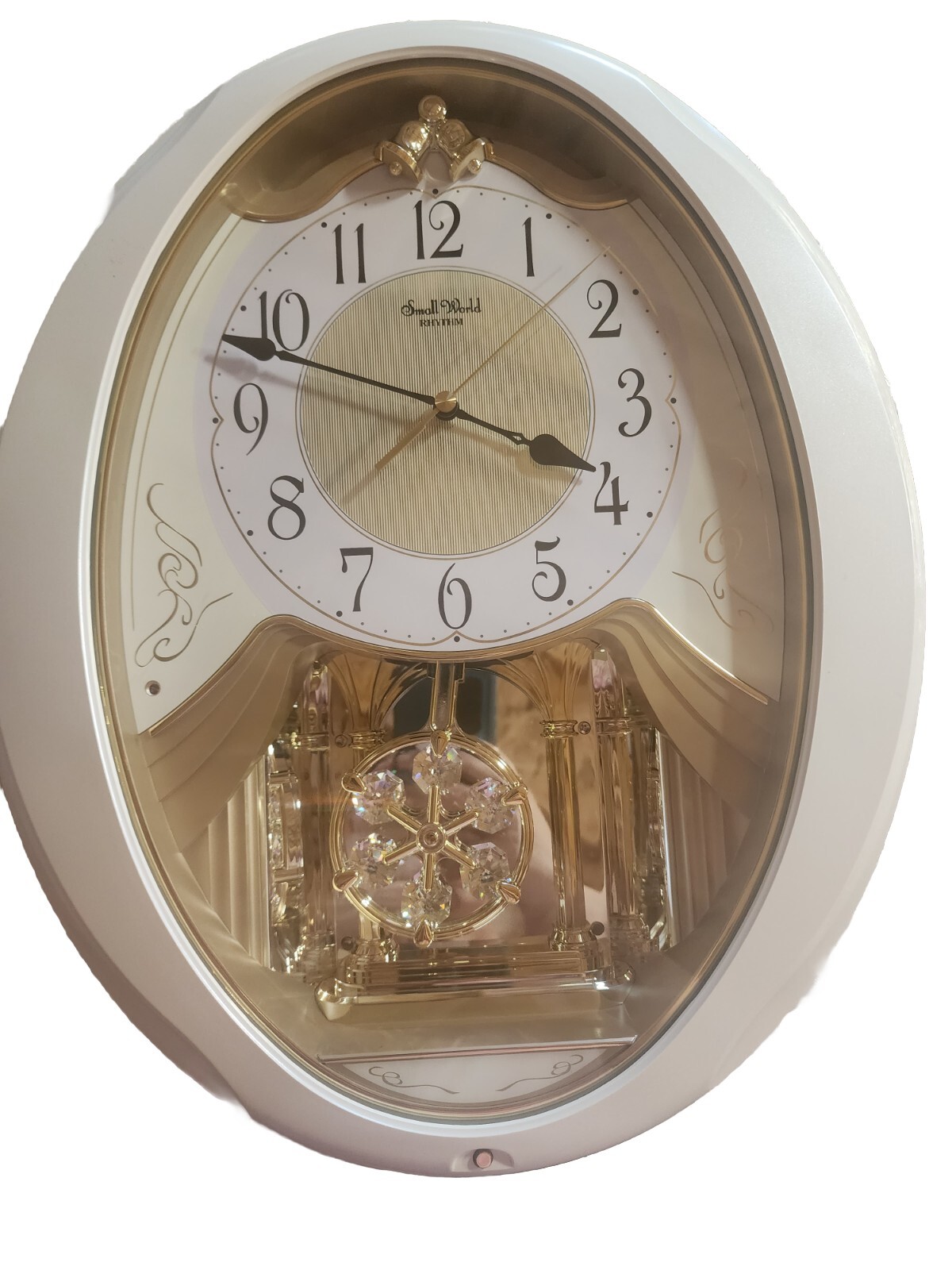 Rhythm small world musical wall clock