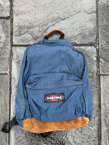 eastpak leather bottom backpack