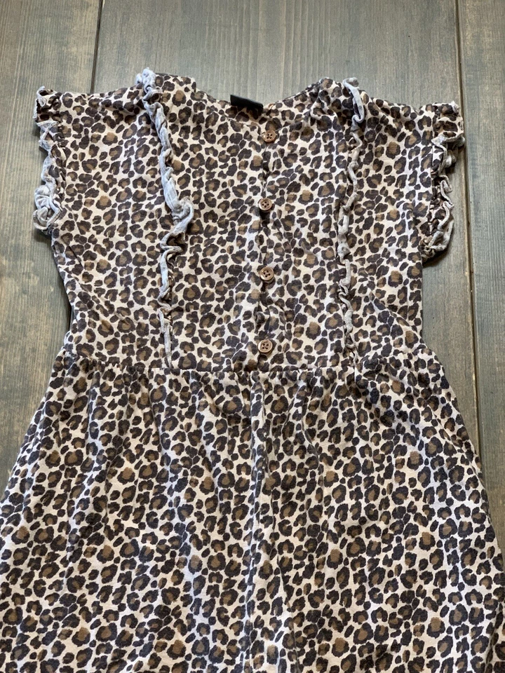 SIGUIENTE Pantalones de jersey para niñas pequeñas sin mangas marrón estampado de leopardo Talla: 2-3 años Foto 2 de 4