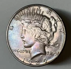 1934-D Peace Dollar XF-AU. Rainbow Toned 90% Silver Coin