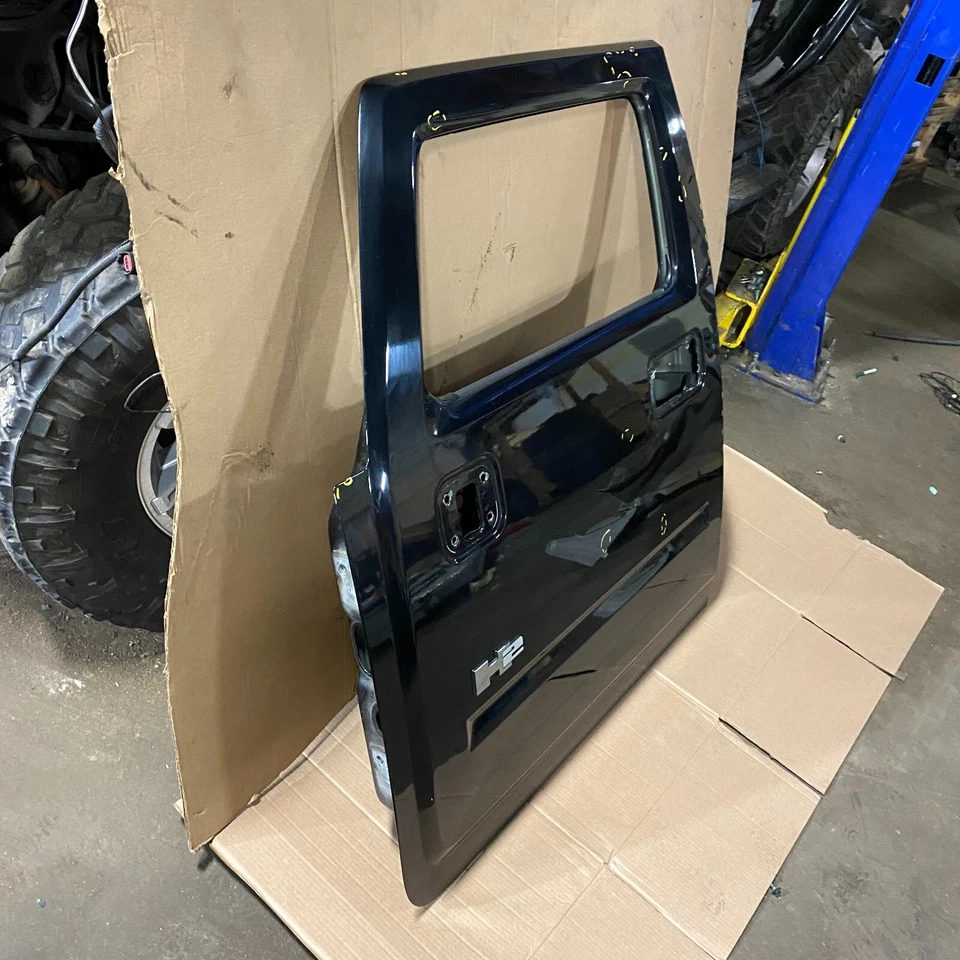 Hummer H2 2003-2009 panel de carcasa de puerta del lado del conductor delantero izquierdo OEM negro 🚗 Foto 2 de 4