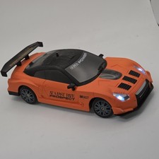 2.4GHz RC Sports Car Orange Black Remote Control LED Lights Rechargeable 7in
