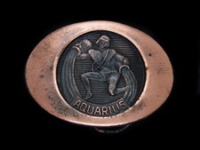 TB07116 VINTAGE 1976  AQUARIUS  ASTROLOGY  ZODIAC COPPERTONE BELT BUCKLE