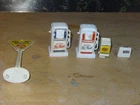 LOT OF 7 VINTAGE MARX  GAS STATION PLAYSET PIECES, PUMPS, DIAGNOSTIC, SIGN, CASE