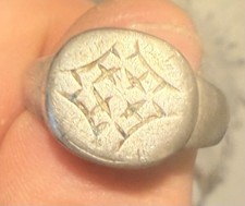This is an ancient Roman silver signet ring, dating to the 2nd-4th century AD