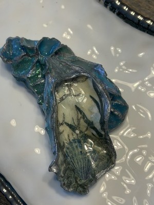 Decoupage shades of blue oyster shells attached when I found them.  Unique piece