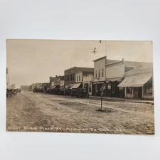 Postcard Armour South Dakota (Warped) West Main Street 1920s Bank Ford Sign RPPC