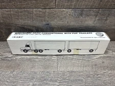 ERTL White GMC Aero Conventional with Pup Trailers 1/64 Die Cast
