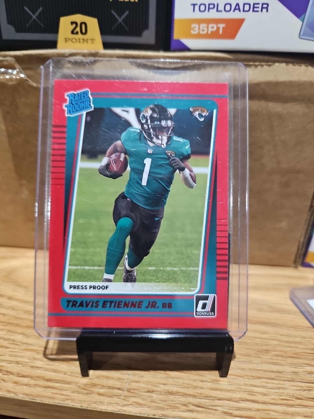 2021 Panini Donruss - Rated Rookie Travis Etienne #258 Press Proof Red (RC)