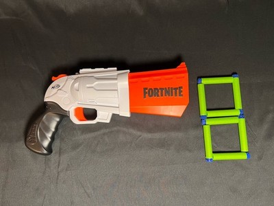 NERF Fortnite SR Blaster: Gray and Orange, it comes with eight brand new darts. 