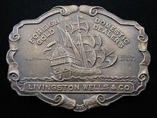 RI07101 VINTAGE 1970s LIVINGSTON WELLS CO. GOLD DEALERS BELT BUCKLE