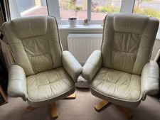 TWO Leather Recliner Swivel Chairs In Cream Leather