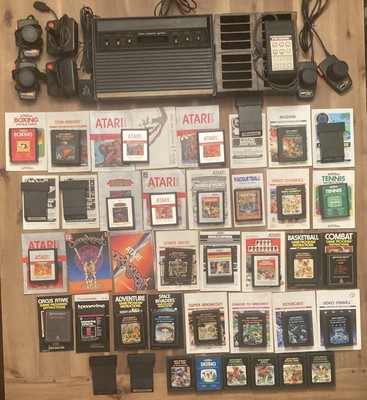 Atari CX2600 Console 37 Games Joysticks Paddles Manuals Tron ET Raiders LostArk