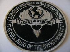 HELEN KELLER QUOTE  ALTHOUGH THE WORLD IS FULL OF SUFFERING LOVE EVERYBODY PATCH