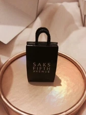 Estée Lauder Saks Fifth Avenue shopping bag solid perfume