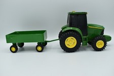 Vintage John Deere Lights and Sound Plastic Tractor and Diecast Trailer
