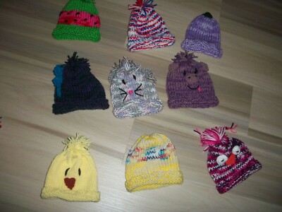 ..BABY GIRLS LOT OF 9: HAND KNIT CHARACTER HATS...SIZE NB - 18 MO   NEW !!!