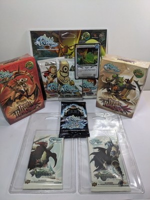 WAKFU TCG Konvolut - Versiegelt: 1 Tripack + 3 Booster + 2 Starter Decks.