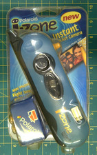 New sealed in package Polaroid i-Zone Instant Pocket Camera have Blue or Red