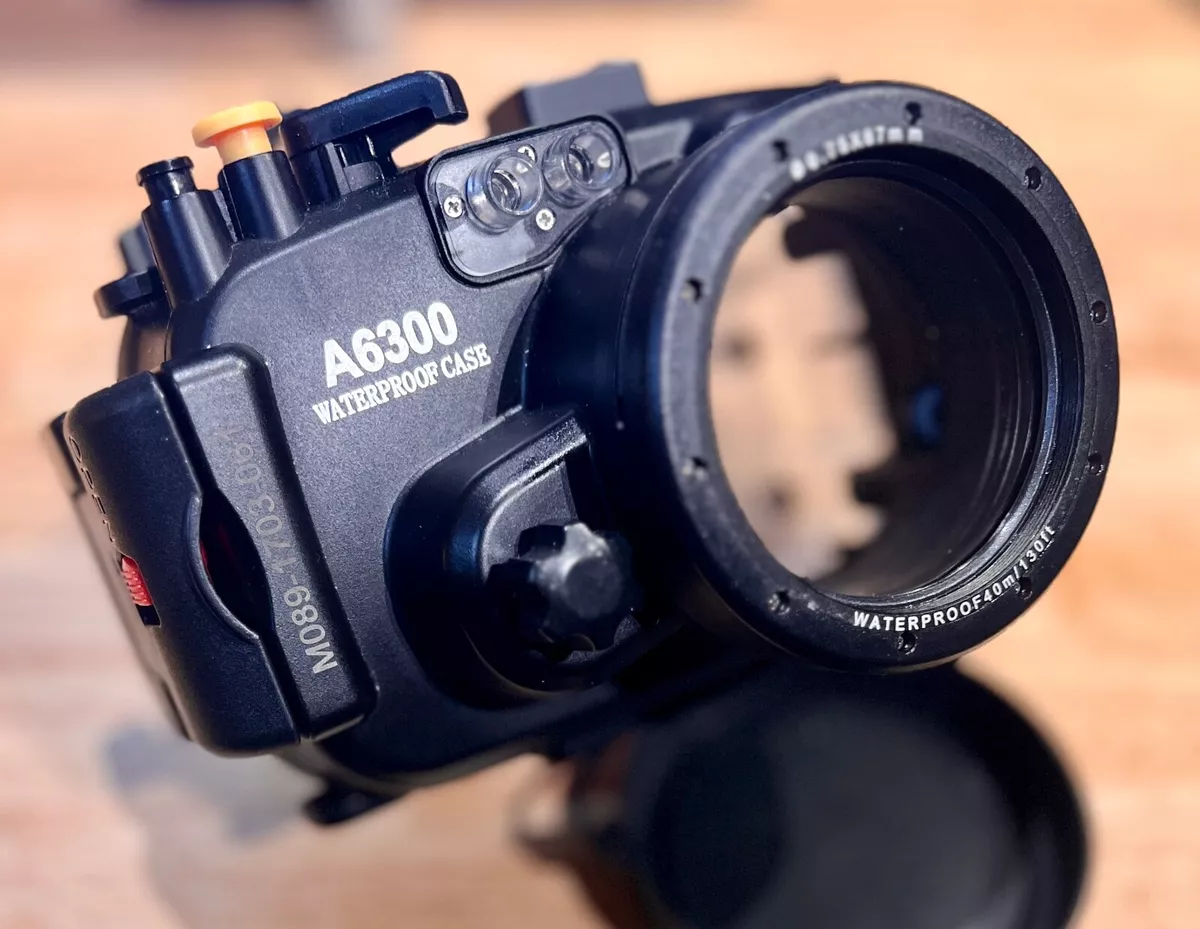 40m Waterproof Splash Housing and extras Sony A6300 Camera w/16-50mm, used once.