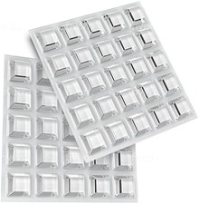 Clear adhesive rubber feet for furniture and electronics.