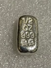 999 SILVER SKULL & CROSSBONES 1/2 TROY OUNCE  LOAF STYLE BAR ATLANTIS MINT