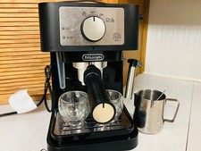 DeLonghi Espresso machine & accessories, used under 10x! Less than a year old!