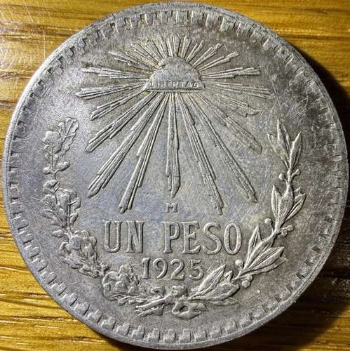 1925 Mexico Un Peso Silver — photo from the most recent tracked eBay sale