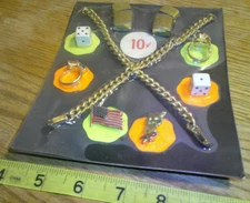 Vintage display 10c card rings lighters  dice #jd345