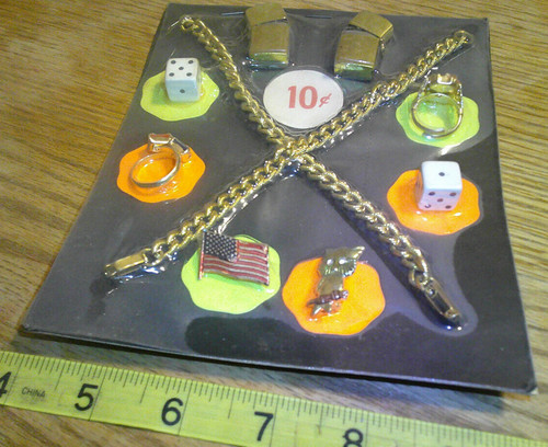 Vintage display 10c card rings lighters  dice #jd345