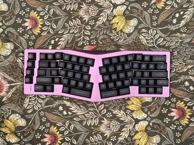 Purple QwertyKeys Neo Ergo Mechanical Keyboard