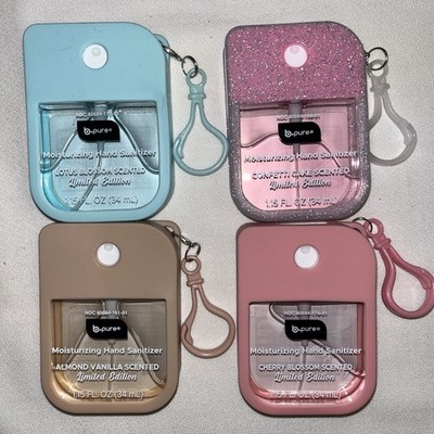 B-PURE SANITIZERS W/multi Colored Cases  1oz.  Sold As A Lot Of 4