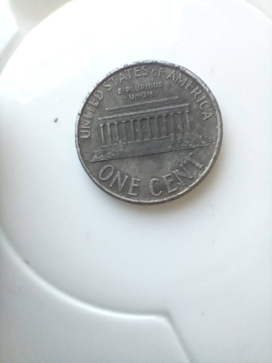 1993 lincoln cent (missing clad error)/ Close AM, Uniquely A Black