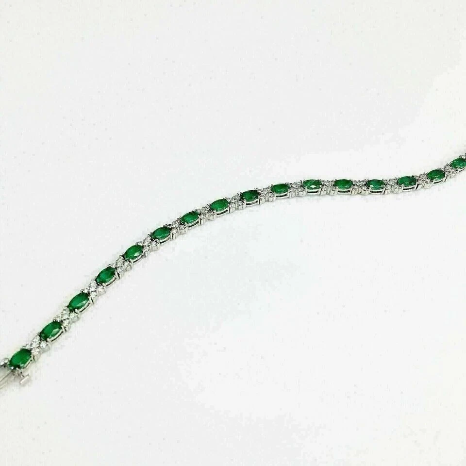 Brazalete de tenis para mujer de diamantes y esmeraldas de corte ovalado de 12 quilates de oro blanco de 14 quilates de más de 7" Foto 3 de 4