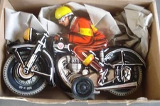 Motorcyclist in Black Made in Germany Dunlop Cord, collect tinplate friction toy