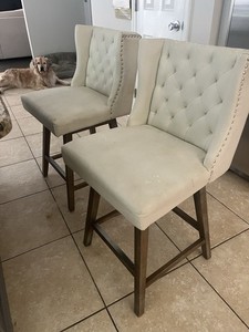 Two Tall Swivel Bad Stools Padded Fabric Seats And Wooden Legs