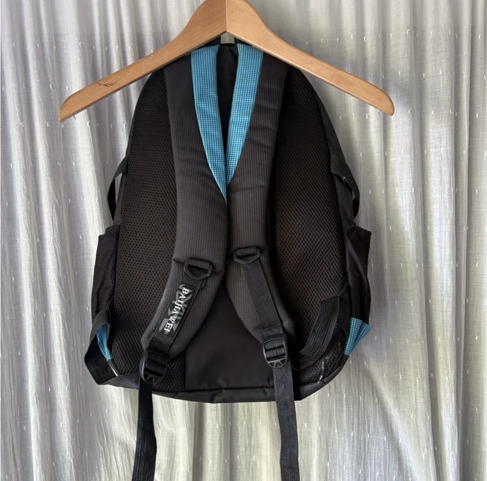 Mochila azul y gris con portabotellas de agua y varios compartimentos Foto 2 de 4