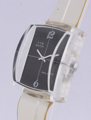 F.H.B. WATCH HERREN-ARMBANDUHR IN EINEM ACRYL-GEHÄUSE - HANDAUFZUG 70er JAHRE