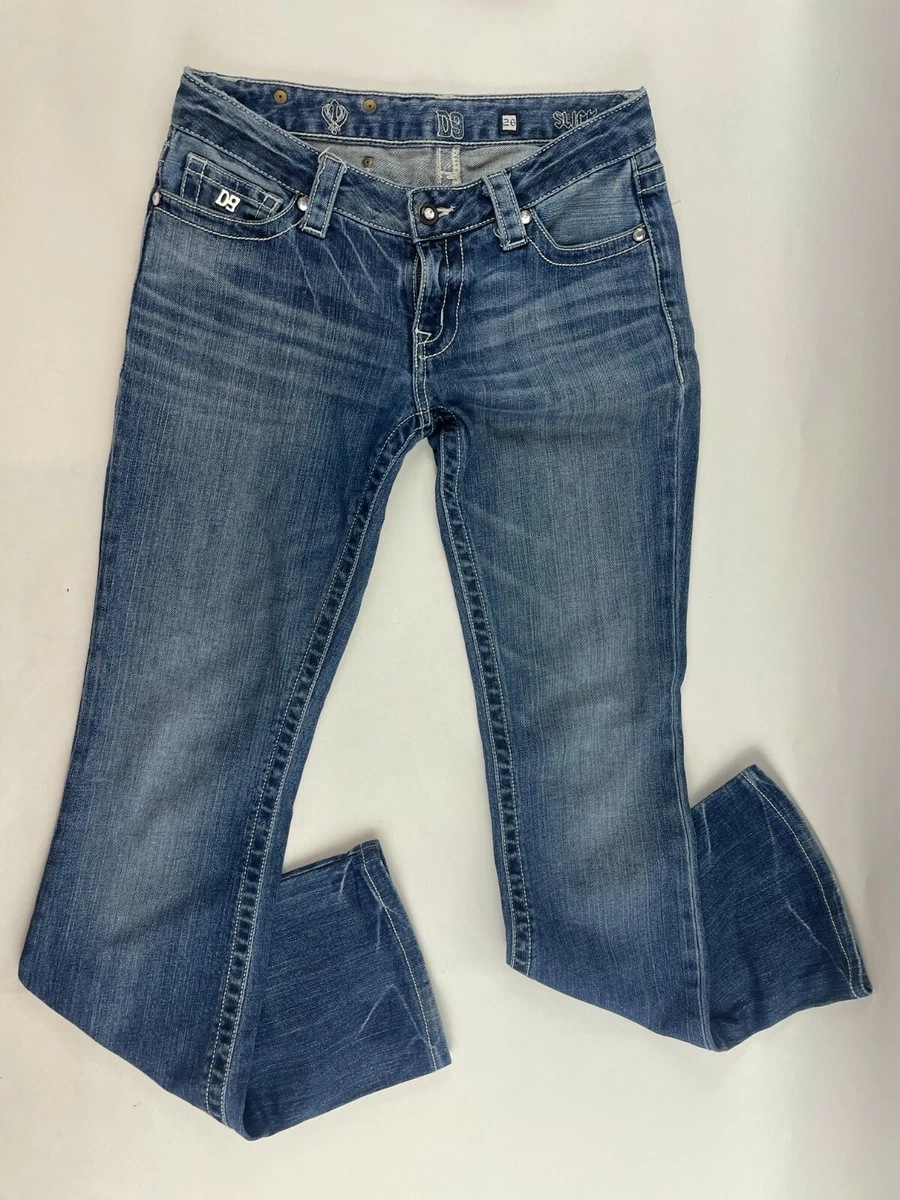 Jeans with cheap bling on legs