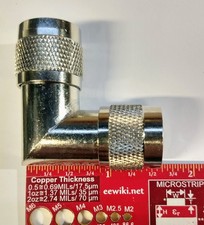 N Male to N Male Right Angle Adapter Metal Body  Nickel Plated