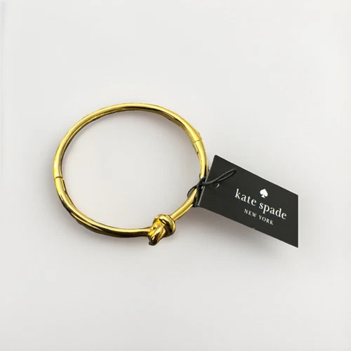 Bracciale donna Kate Spade oro marinai nodo cerniera metallo placcato oro NUOVO