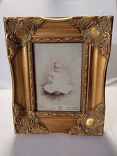 Early 19th Centry Vintage Baby Picture comes with Scalloped Wood Frame.