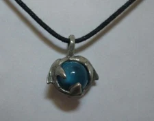 Silvertone Pair of Dolphins Blue Marble Pendant
