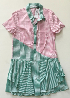 pink and green tennis dress Tennis time in the Cricket Dress P.S. Is there someone we can talk to about changing all tennis balls from green to pink? Asking for a friend