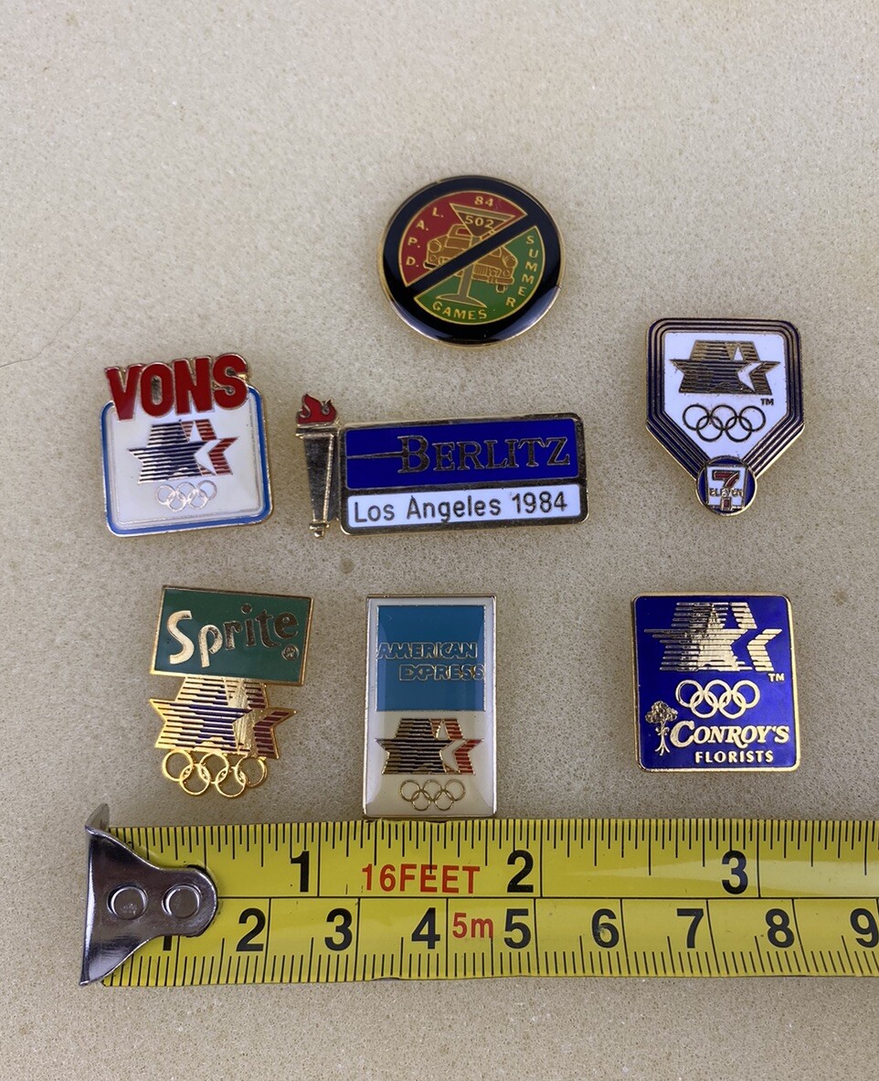 1984 Los Angeles Olympics pins Set of 7, LAPD, Sprite, 7-11, Amex, Vons, Conroys