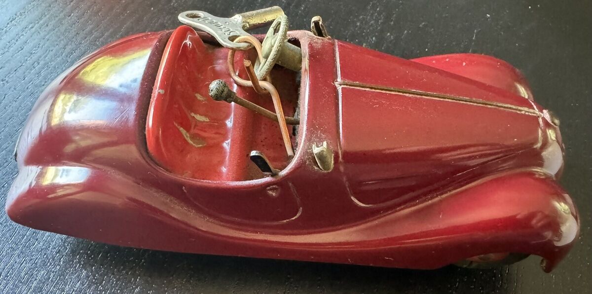 Schuco Examico 4001 Windup Metal Car Maroon Red Original Schuco Examico 4001 Windup Metal Car Maroon Red Original