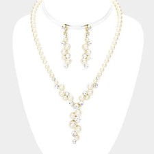 Classy pierced gold, clear stone  pearl necklace and earring set