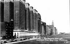 RPPC Postcard Stevens Hotel Michigan Avenue Skyline Chicago Illinois IL Old Cars