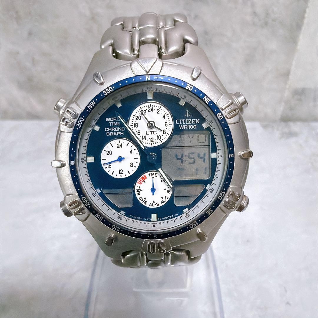 CITIZEN C300 Q01440 World Time Analog Digital - Gem
